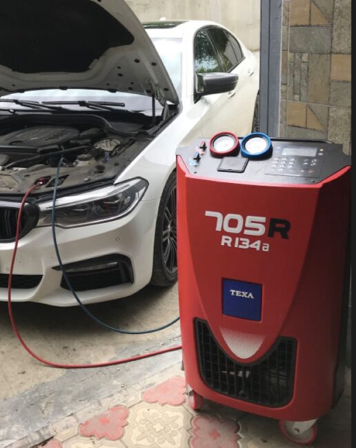 BMW connected to a TEXA 705R R-134a A/C recharge machine at Iron Wolf Motors in Worcester, MA
