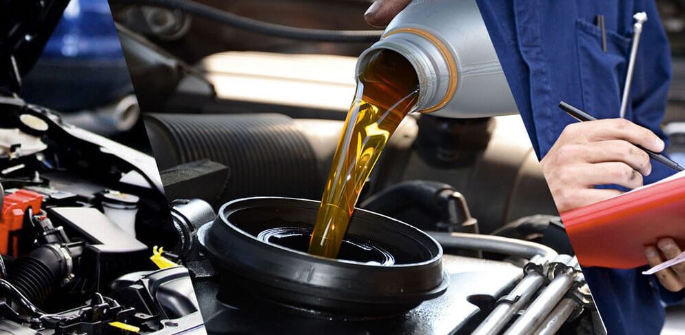 Fresh motor oil poured during an oil change service at Iron Wolf Motors in Worcester, MA