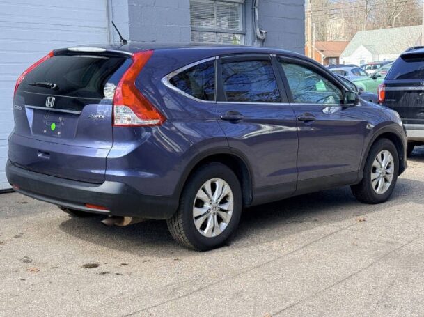 Blue Honda CR-V for sale on the Iron Wolf Motors lot in Worcester, MA
